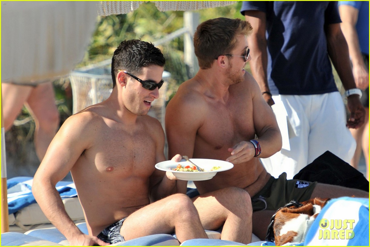 A shirtless Lance Bass and his boy Michael Turchin grab a bite to eat on th...