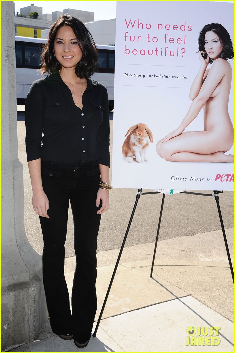 Olivia Munn Photos Photos - Olivia Munn Debuts Her PETA Ad 