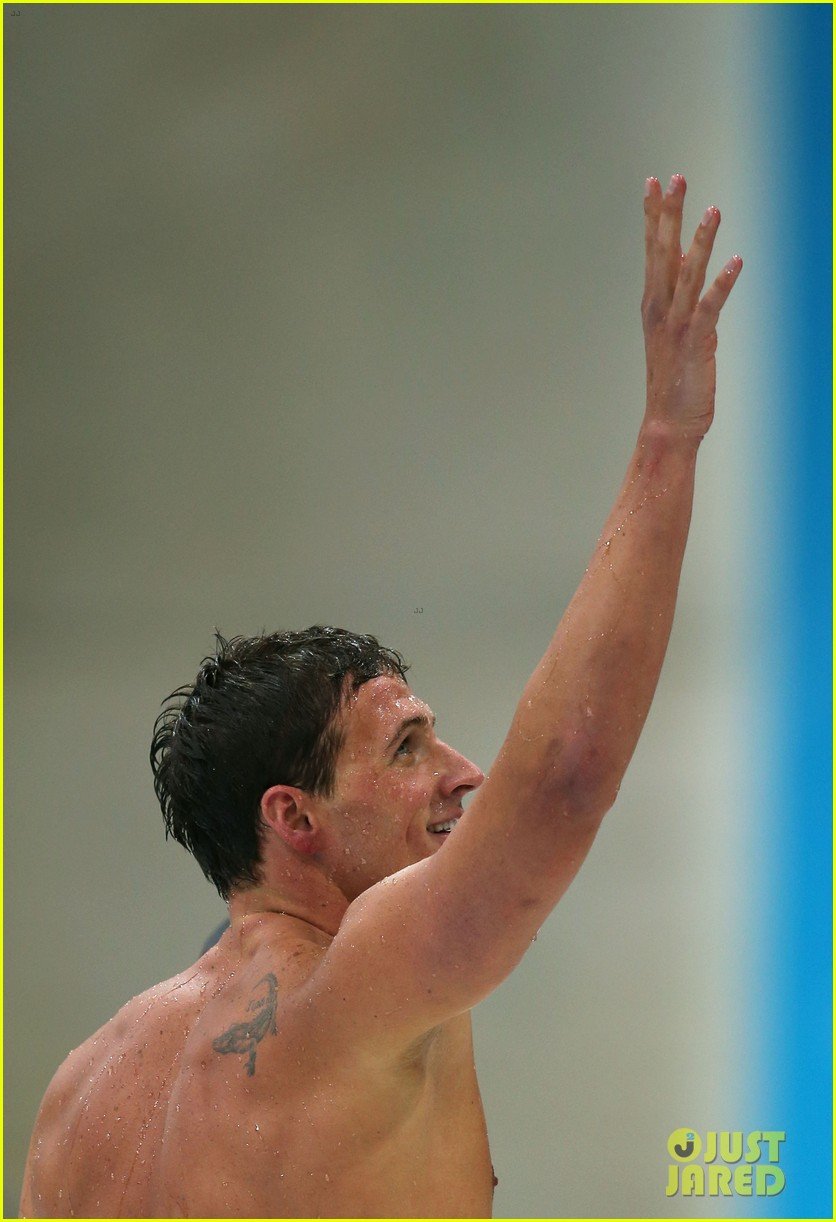 Ryan Lochte American Flag Grill at London Olympic Games! Photo
