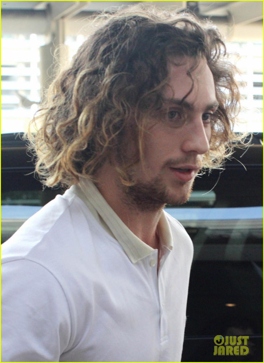 Aaron Taylor Johnson Airport With Sam Wylda Romy Photo