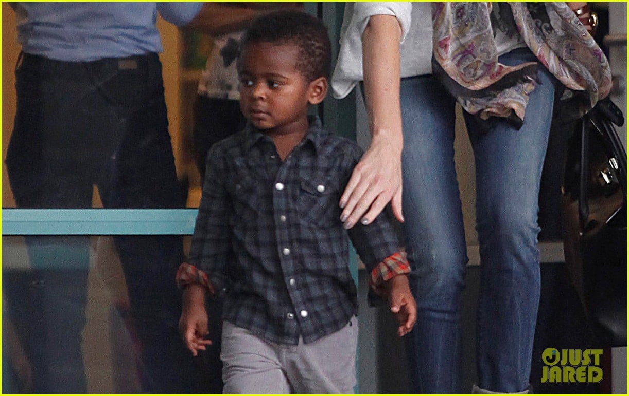 Charlize Theron Has Neck Surgery, Covers Up Scar with Scarf Photo