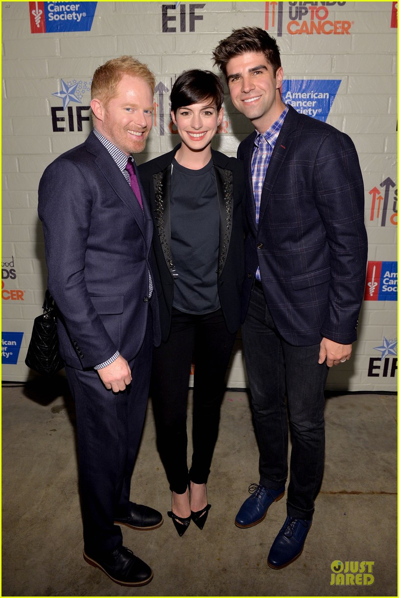 Anne Hathaway & Jesse Tyler Ferguson Smile for Stands Up to Cancer