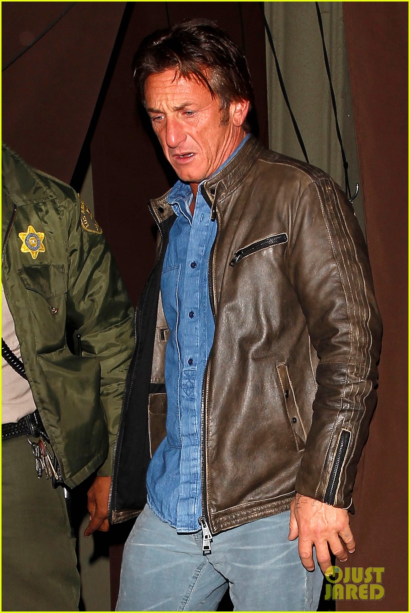 Sean Penn Escorted to Car By Armed Sheriff After Dinner Out Photo