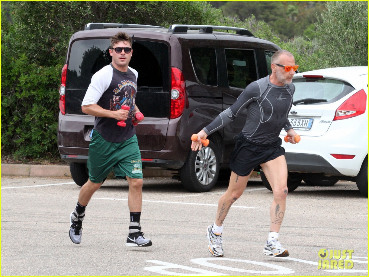 Zac Efron Works on His Fitness with Gianluca Vacchi in Sardinia! Photo