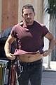shia labeouf lifts his shirt bares torso 02