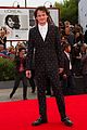 milla jovovich cradles baby bump at premiere 22