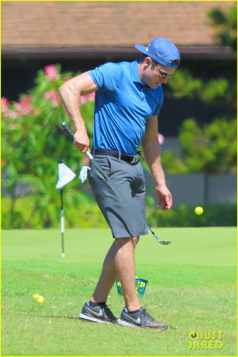 Zac Efron's Muscles Bulge Out of His Shirt While Playing Golf Photo
