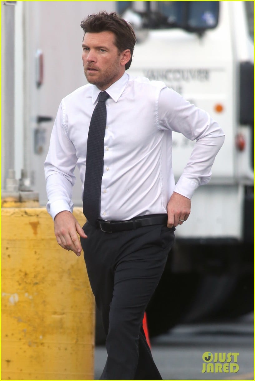 Sam Worthington Shows Some Chest Hair On Shack Set Photo