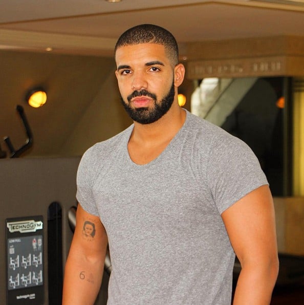 [Image: drake-looks-incredibly-buff-in-new-worko...tos-02.jpg]