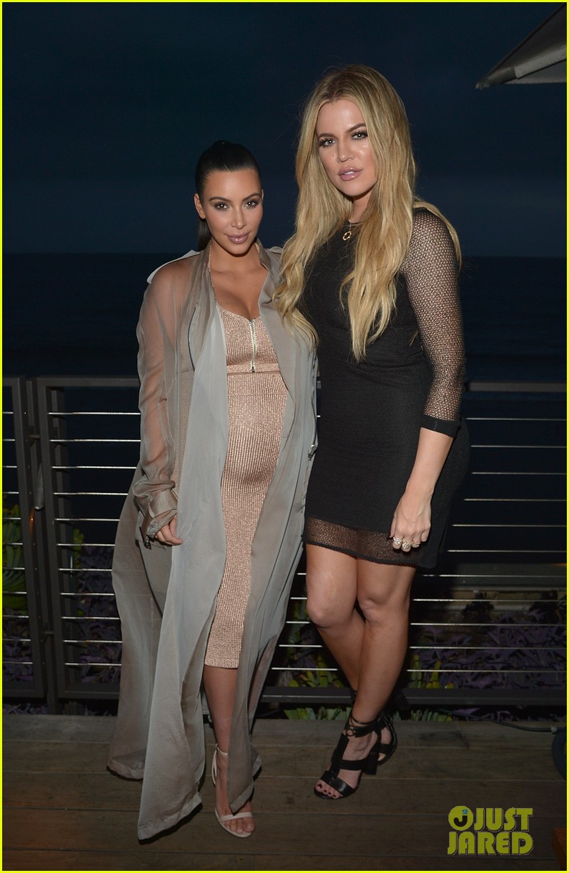 kim kardashian displays baby bump at her website launch 01