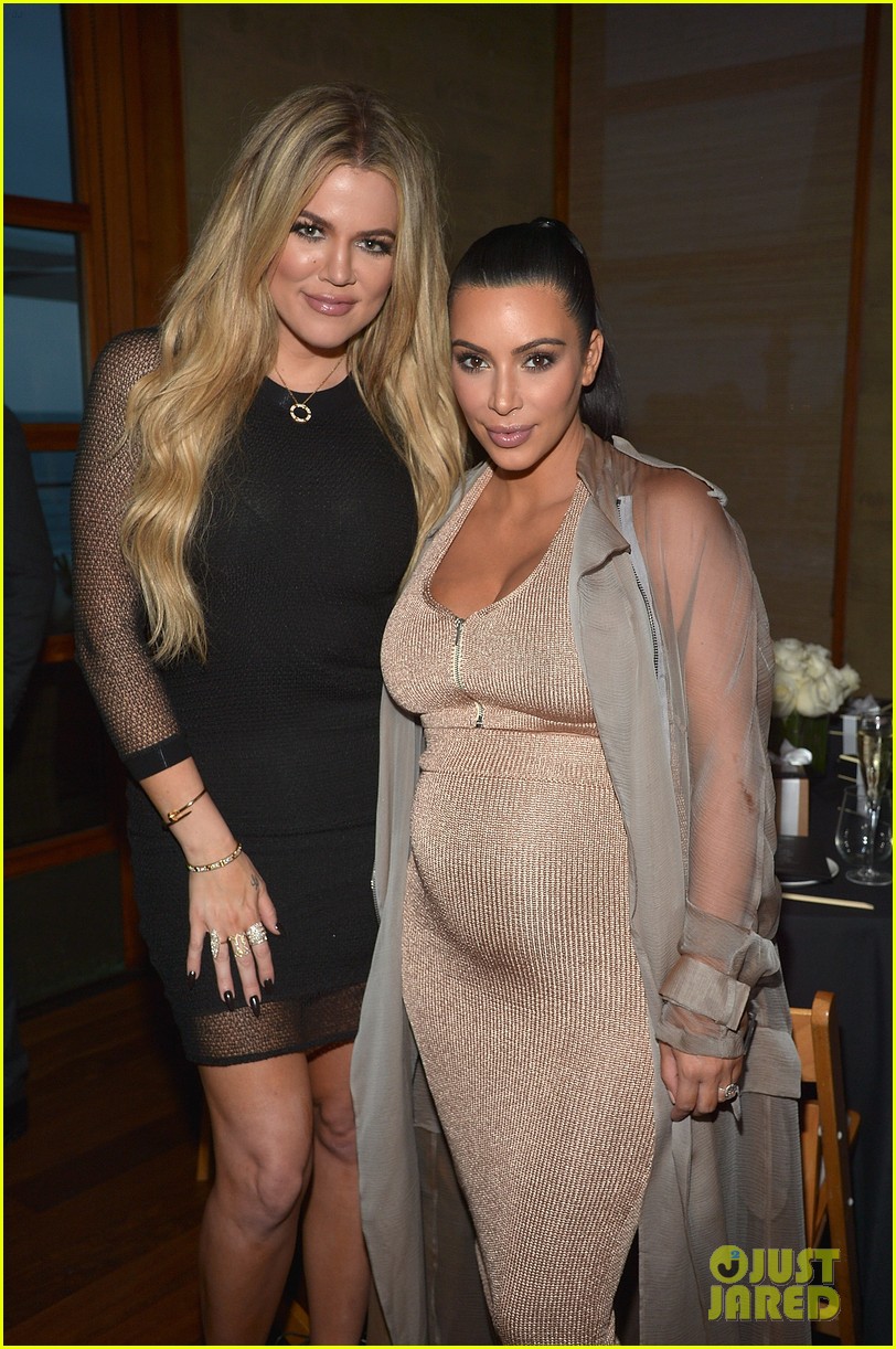 kim kardashian displays baby bump at her website launch 12
