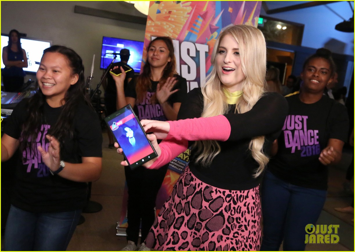 Meghan Trainor Plays Just Dance 2016 During Pop Up Concert Event Photo