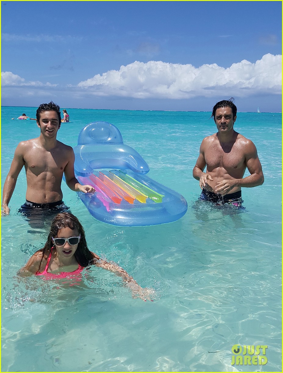 Full Sized Photo of shirtless gilles marini hits the beach 