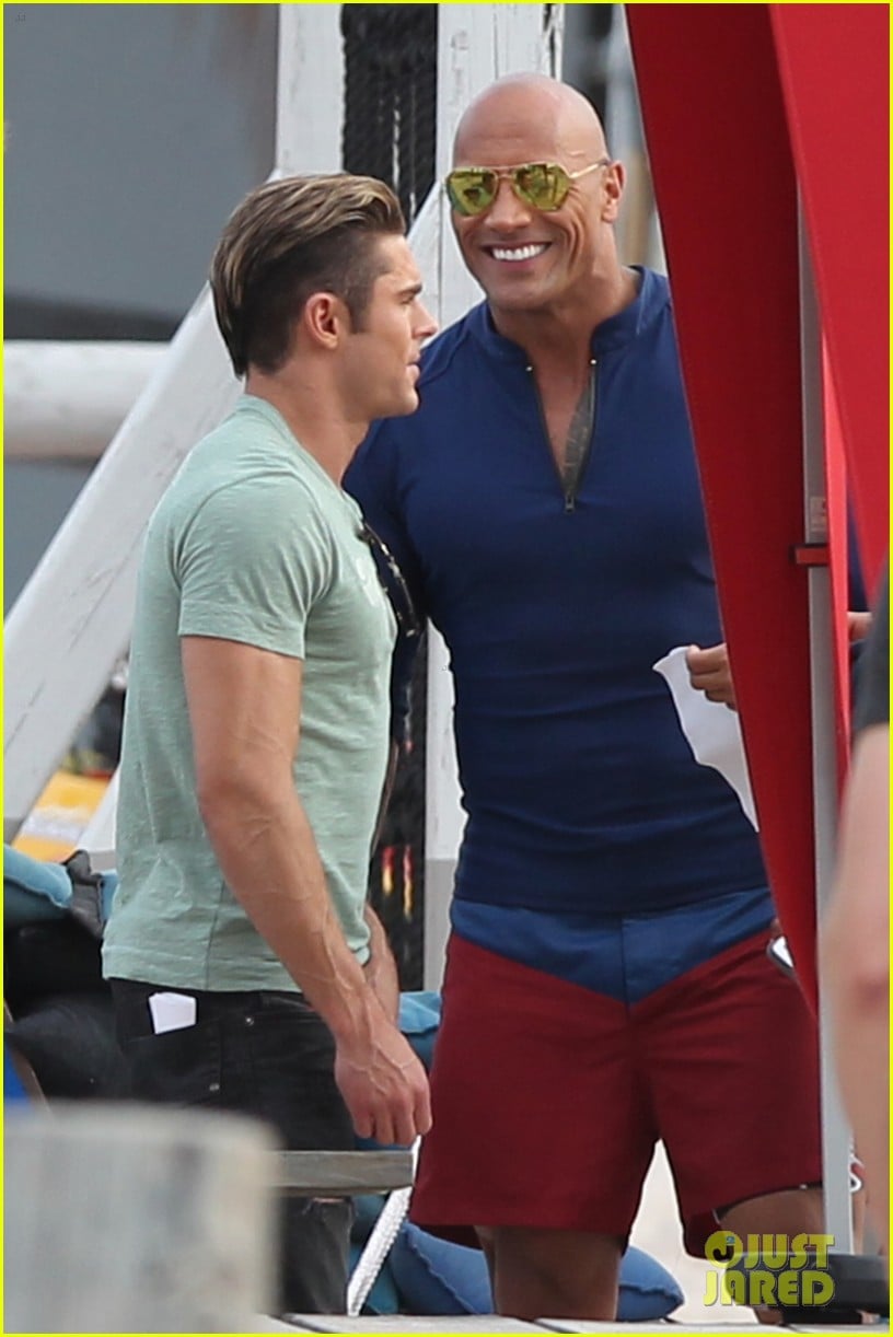 Zac Efron Shows Off Guns On 'Baywatch' Beach Set in Miami Photo