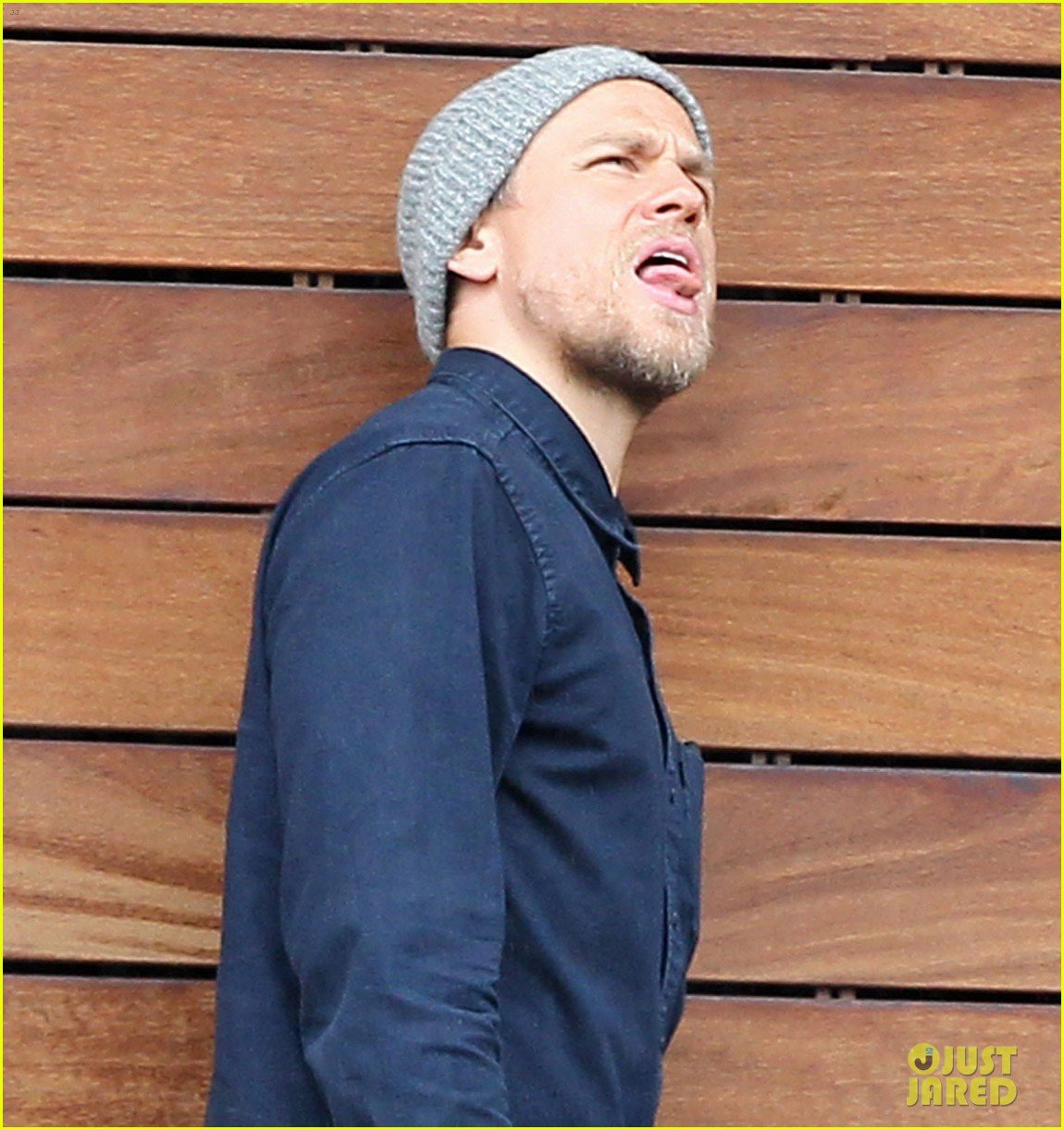 charlie-hunnam-sticks-out-his-tongue-to-