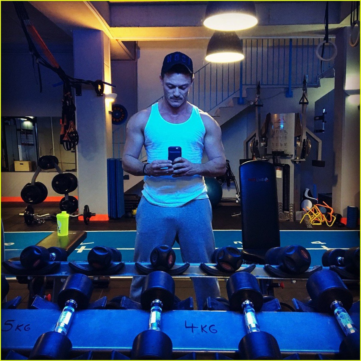 Luke Evans Shows Results of 200 Chest Presses in Shirtless Gym Photo