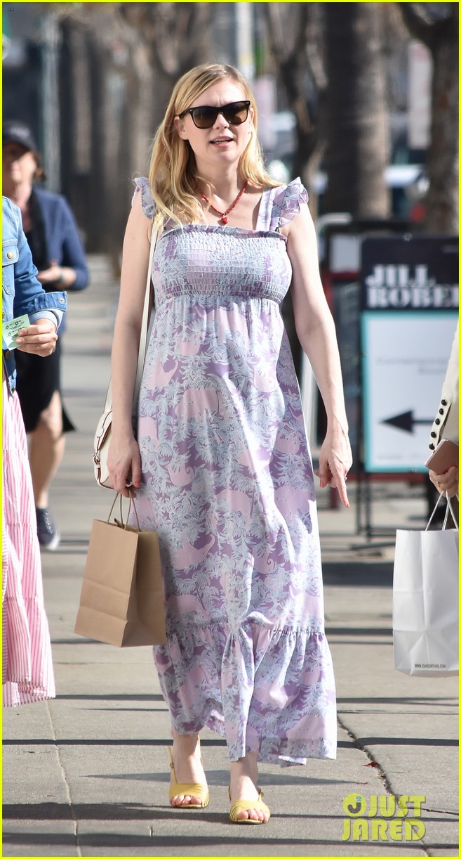 Pregnant Kirsten Dunst Covers Up Baby Bump in Purple Maxi Dress Photo