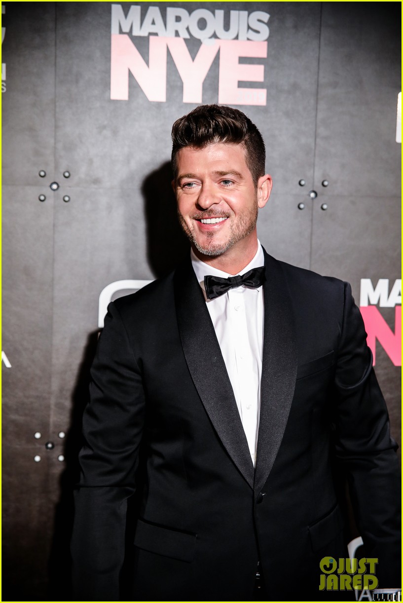 Lindsay Lohan & Robin Thicke Attend Marriott Marquis' New Year's Eve