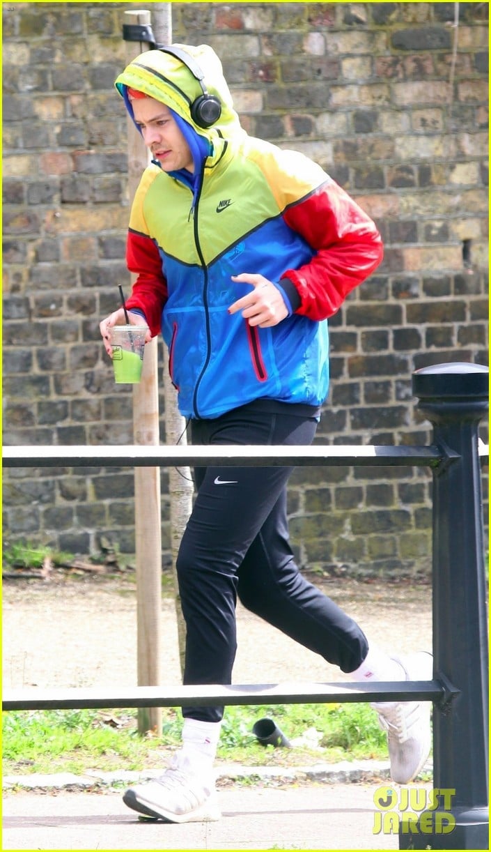 Harry Styles Sports Colorful Jacket While Jogging in