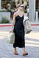 rosie huntington whiteley dons silk dress while grocery shopping 03