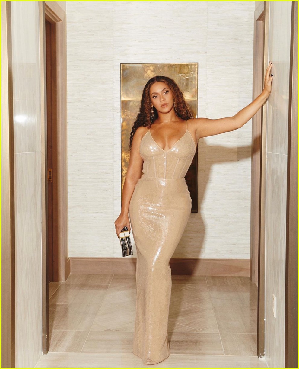 Beyonce Stuns in Sequined Gown & Money Clutch for Shawn Carter