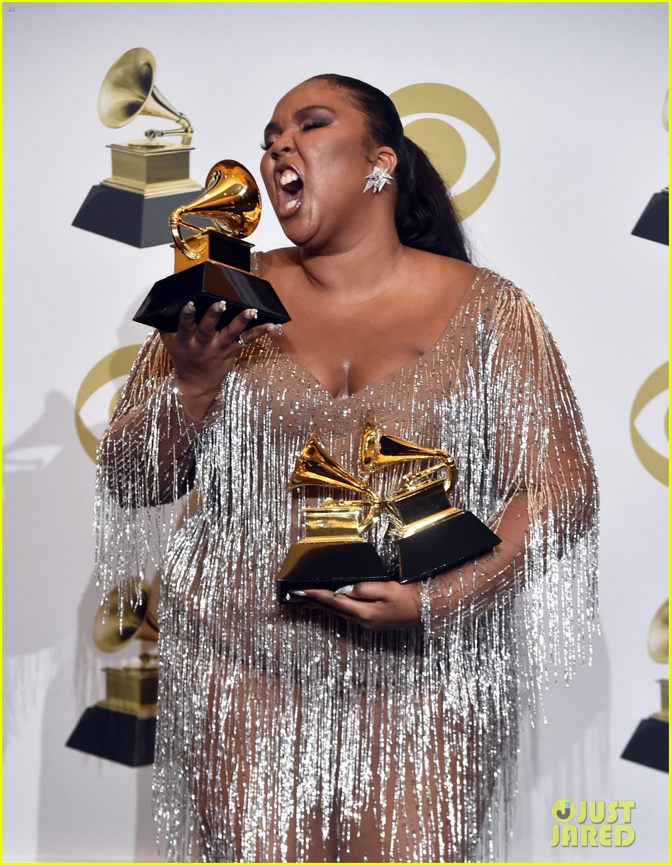 Lizzo Dazzles in Silver While Posing with Her Grammy Awards! Photo