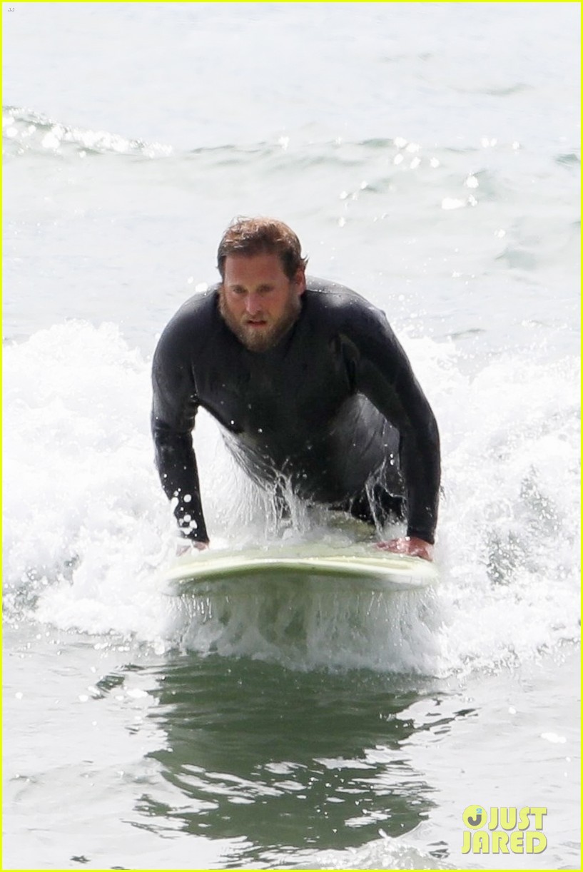 Jonah Hill Shows Off Tattoos While Stripping Out of Wetsuit Photo