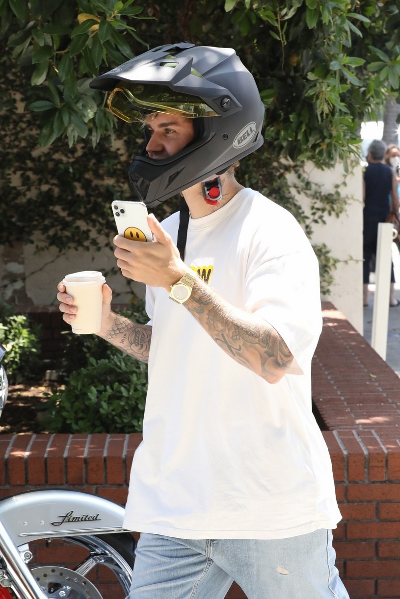 Justin Bieber Wears His Motorcycle Helmet To Pick Up Drinks After