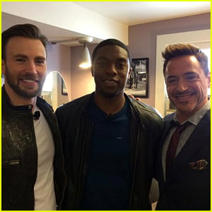 Chris Evans & Robert Downey, Jr. Put Up Their Dukes & Fight On Stage at Marvel Event - Watch Now!