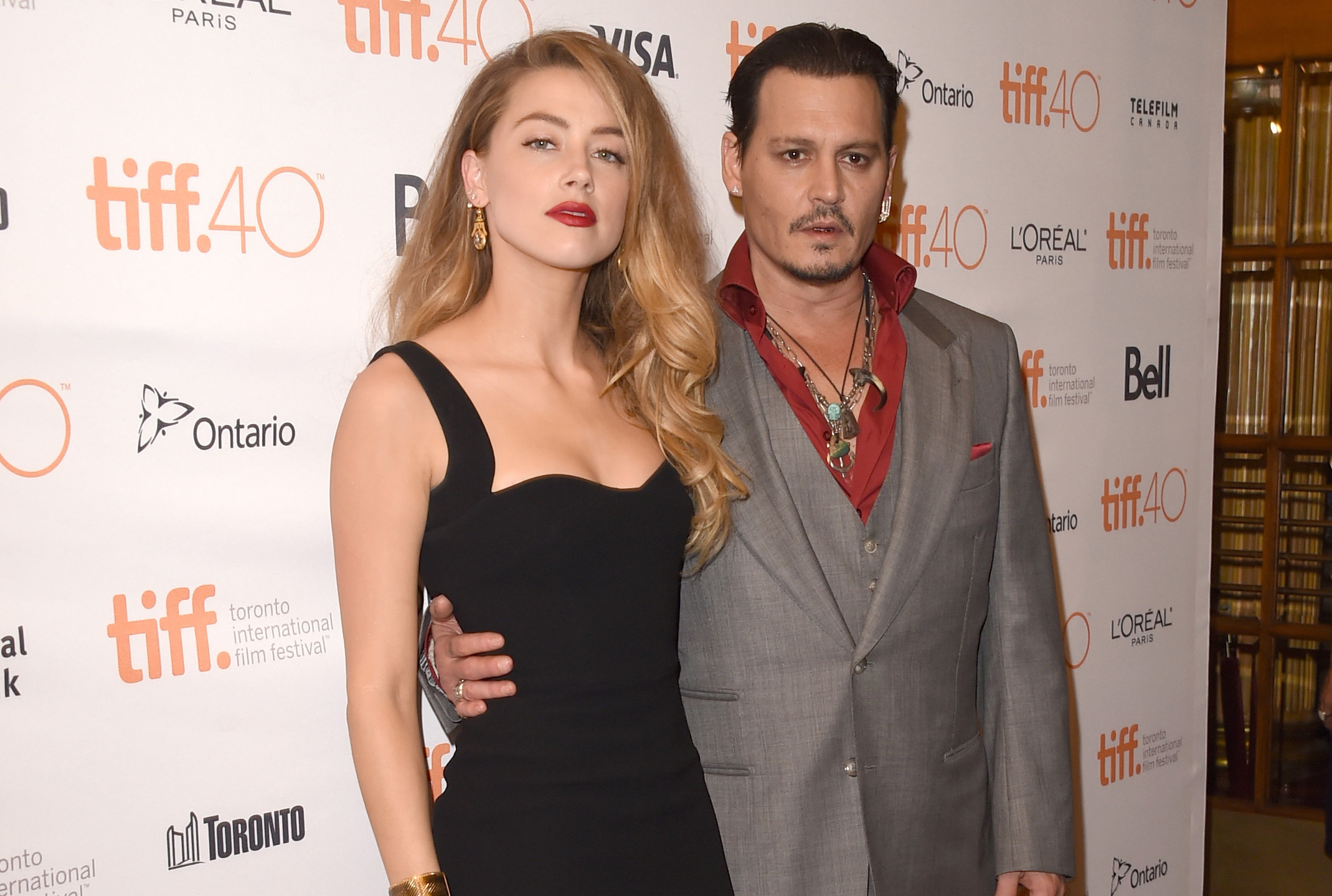 Johnny Depp & Amber Heard Pack on the PDA at ‘Black Mass’ Premiere