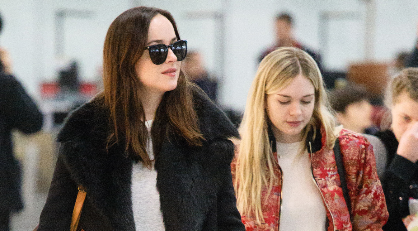 Dakota Johnson Flies Out of London with Sister Stella Banderas