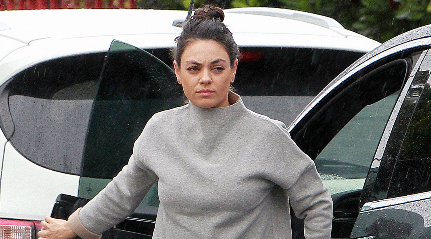 Mila Kunis Braves the Rainy Weather in L.A.
