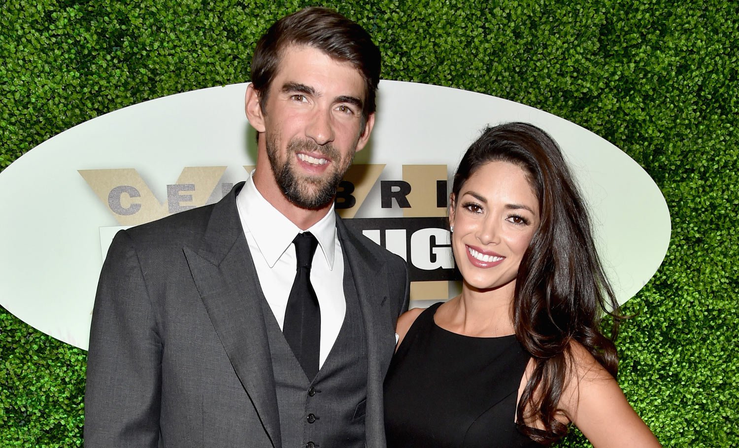 Michael Phelps & Wife Nicole Enjoy Date Night at Celeb Fight Night!