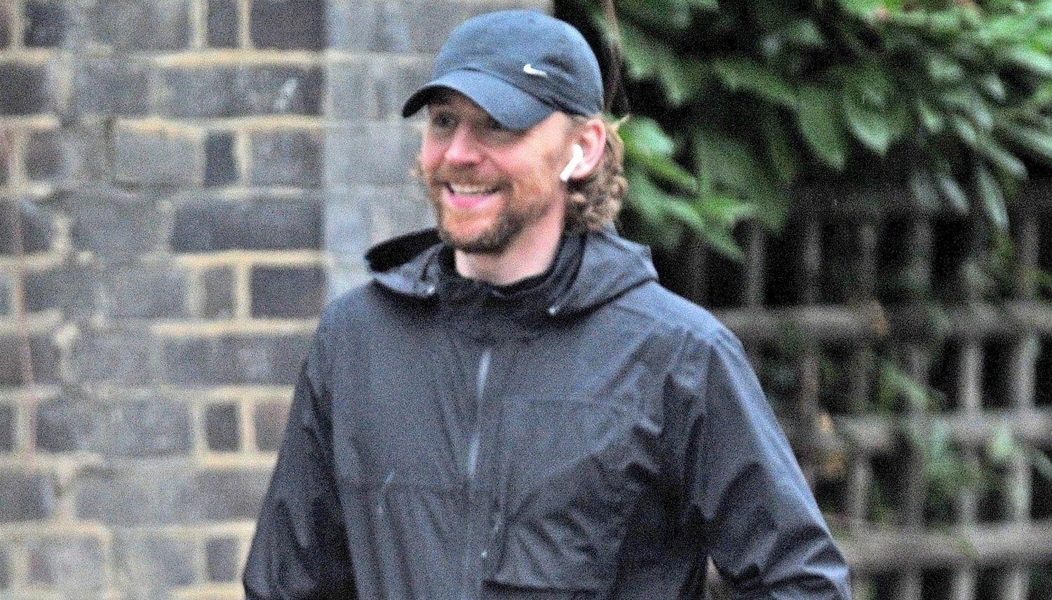 Tom Hiddleston Flashes a Big Smile While Walking His Dog Celebrity