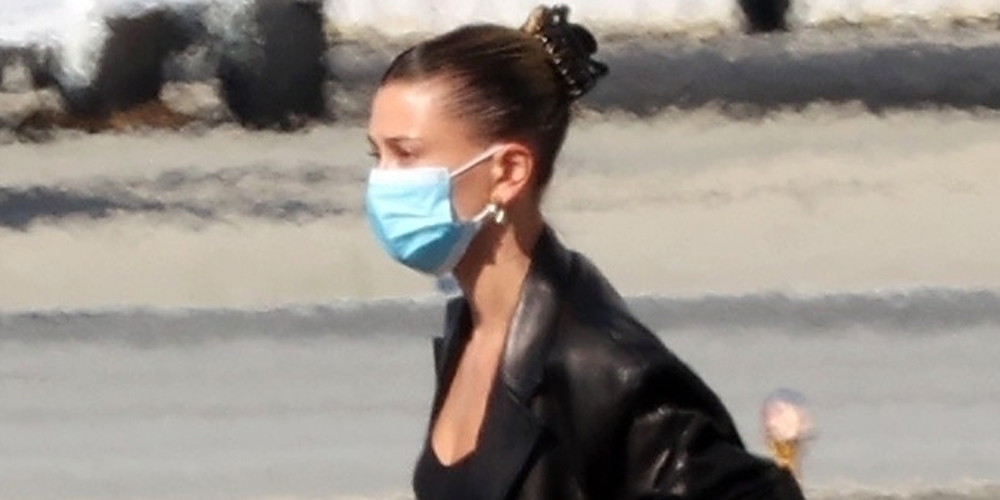 Hailey Bieber Wears a Mask Arriving Back in LA After Italy Shoot